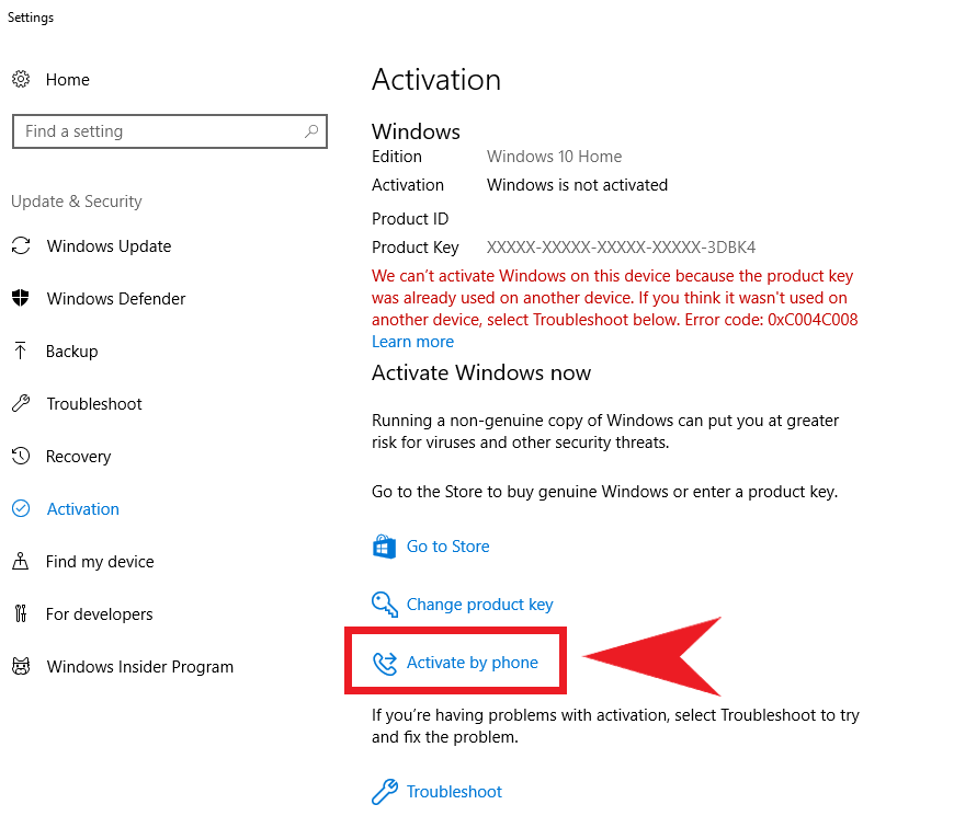 Capture d'écran des paramètres de Windows dans la zone 'Activation'. L'avis 'Windows n'est pas activé' et l'option 'Activer par téléphone' sont mis en évidence