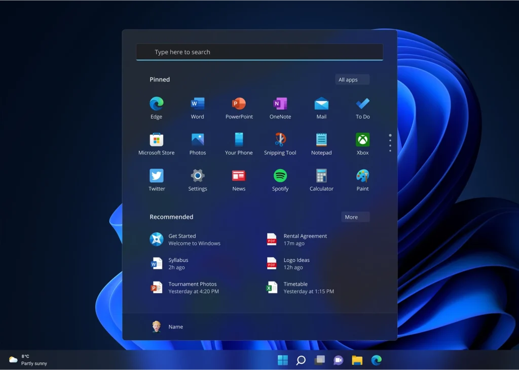 Menu Démarrer de Windows 11 Home ouvert, avec Edge, Word, Mail et PowerPoint épinglés, fonds d'écran bleu par défaut visible.