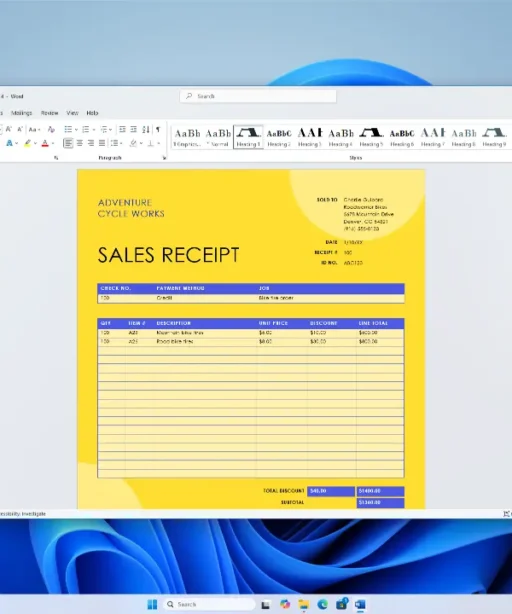 Écran d'ordinateur affichant un reçu de vente Word jaune et bleu avec date, numéro de facture, détails, liste et montant total.